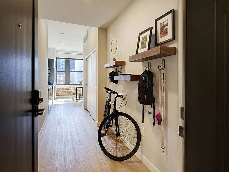 Sleek wood-look flooring throughout.