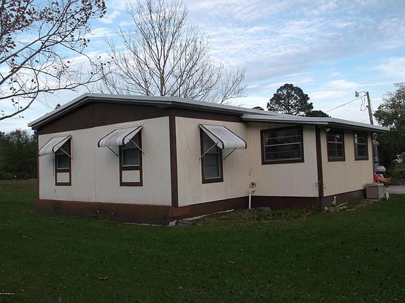 #5465, 1st home, side view w/back porch