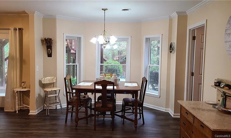 Breakfast room off the kitchen shown for staging purposes.