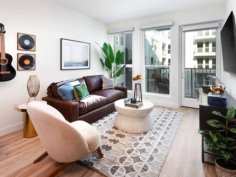 Oversized windows allow plentiful natural light while some homes include private balconies.*