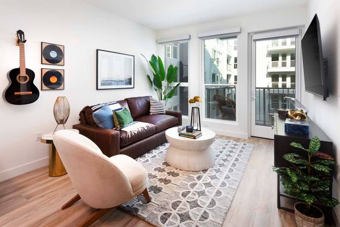 Oversized windows allow plentiful natural light while some homes include private balconies.*