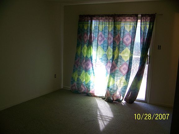 Living Room Downstairs with Sliding Glass Doors to Backyard