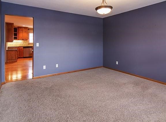 After entering through the front door, just to the right is the formal dining area.