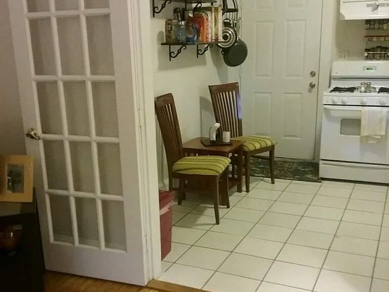 Furnished kitchen photo from a previous tenant.
