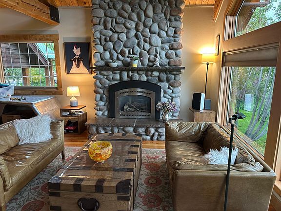 Living room and beautiful fireplace.