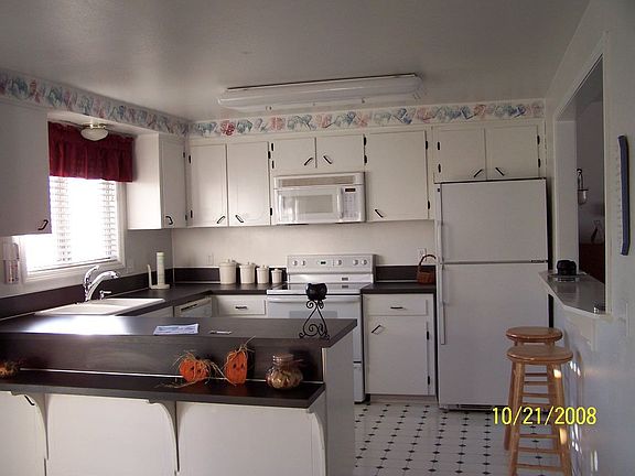 Kitchen with breakfast/kids bar in Dining Room