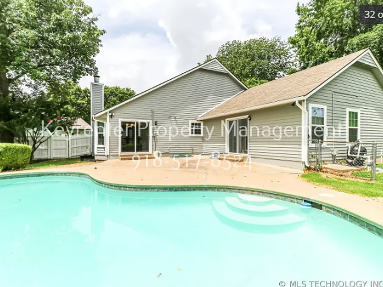 7737 S Trenton Ave — Photo 29