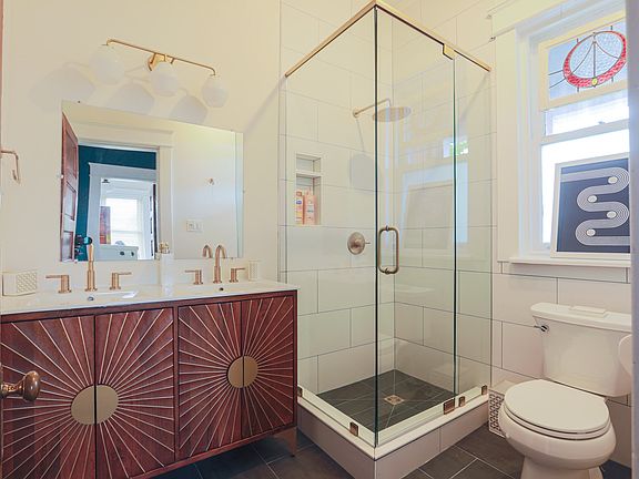 Brand new hall bathroom with double vanity.