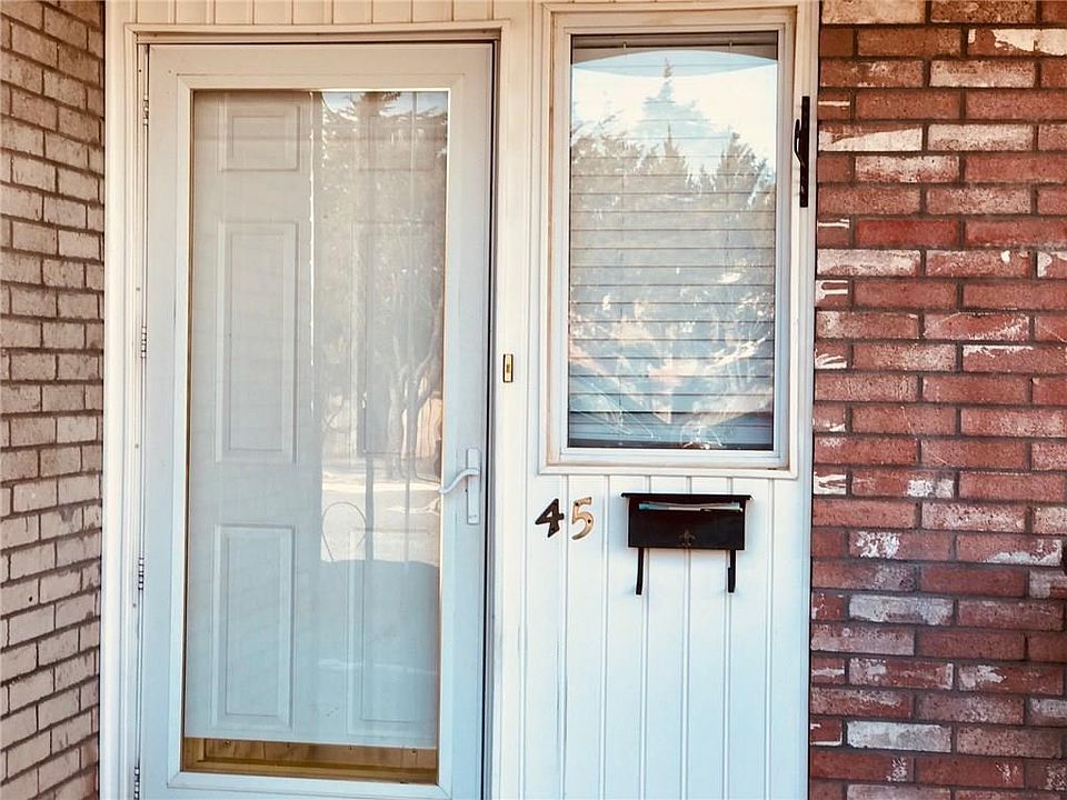 Townhouse with a quaint covered front porch.  Makes for a much easier transition from house to car, car to house in inclement weather.  Or sit outside on Sunny days and enjoy the shade. Completely updated and reduced in price.  You won't want to miss out 