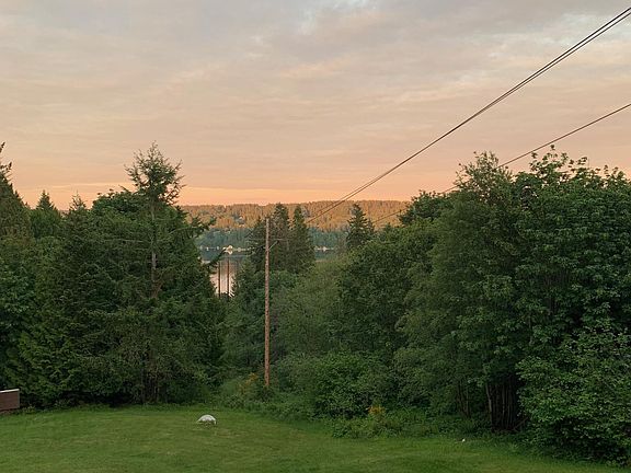 a beautiful afternoon view from deck to Colvos Pass & Vashon Island