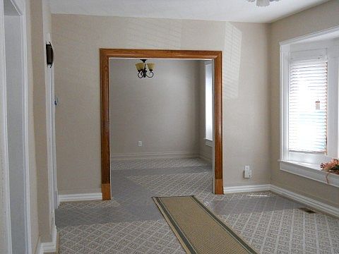 View walking in front door.