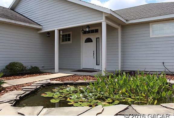 2nd image of 576 NW 232nd Ter