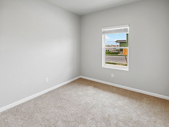 Flex room located off of the entry way, perfect for a home office.