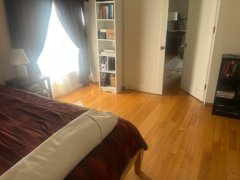 2nd bedroom leads to the living room. Great guest room of office space.