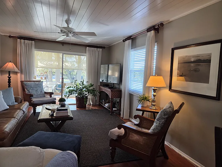 Living area showing Hunter original ceiling fan. Apartment contains Hunter original fans in both bedrooms and in living area