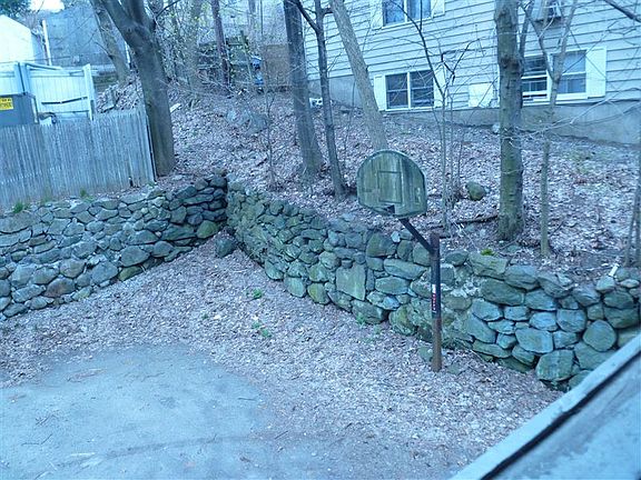 Back Yard with Basketball Hoop
