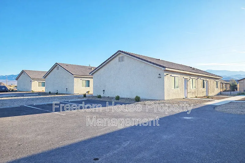 Building Photo - 1121 Sixshooter Ave #2