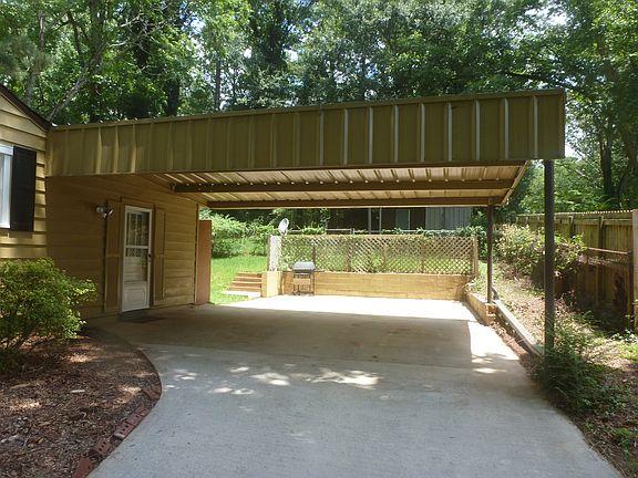 2 Carport plus parking pad areas