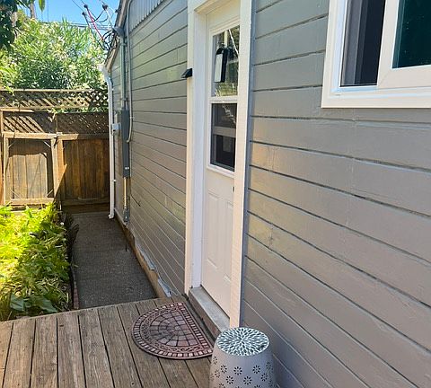 Private front entrance door to studio and private deck.