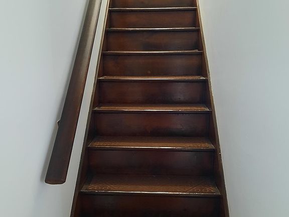 stairs to bedrooms and bathroom