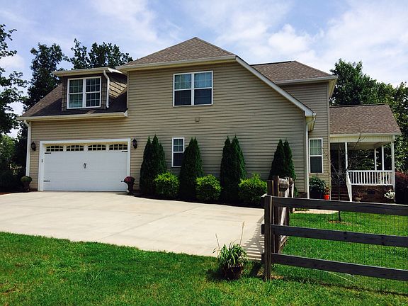 Wide Concrete Drive & Garage