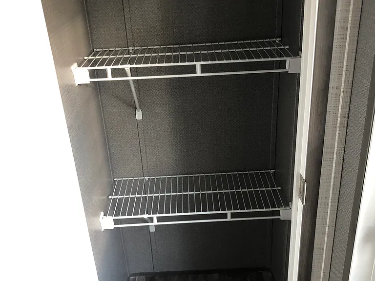 Pantry at back door for kitchen or cleaning storage