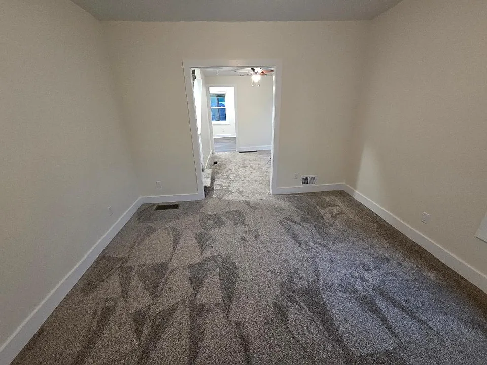 view from front door towards dining room and kitchen