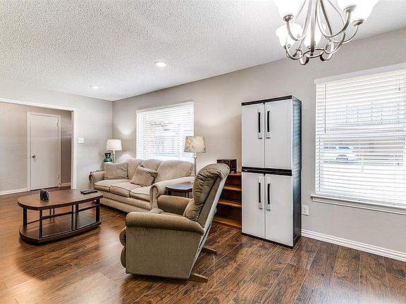New Windows, Flooring, All Light Fixtures, Ceiling Fans and Hardware Have Been Replaced Throughout Home.