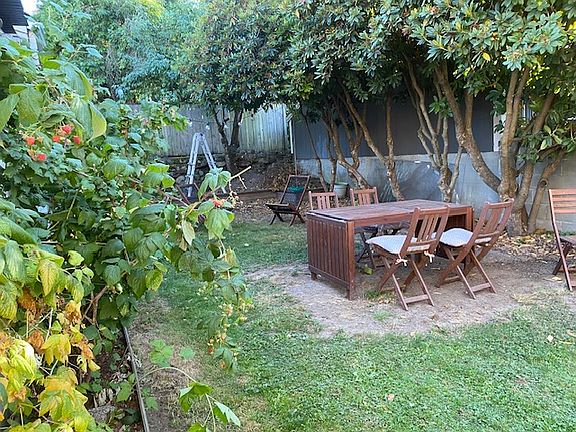 Looking SW, garden sitting area.