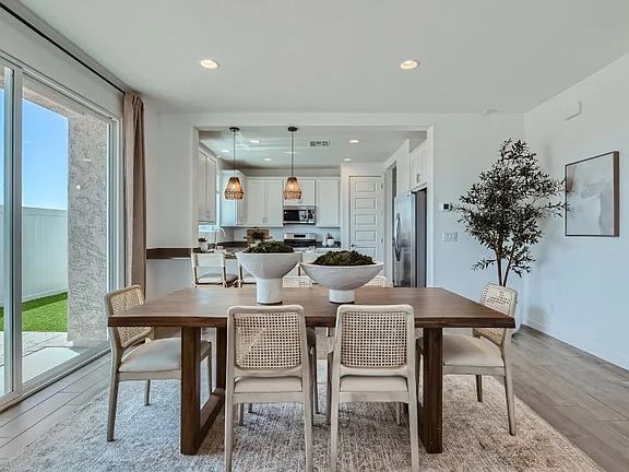 Kitchen & Dining Room. Staged Photo fro Community Website