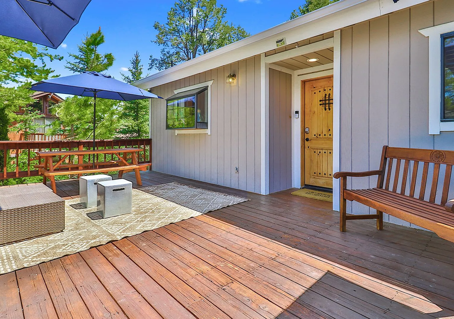Charming 3 Bed Mountain Retreat | Wood Beams, Fireplace & Deck — Photo 4