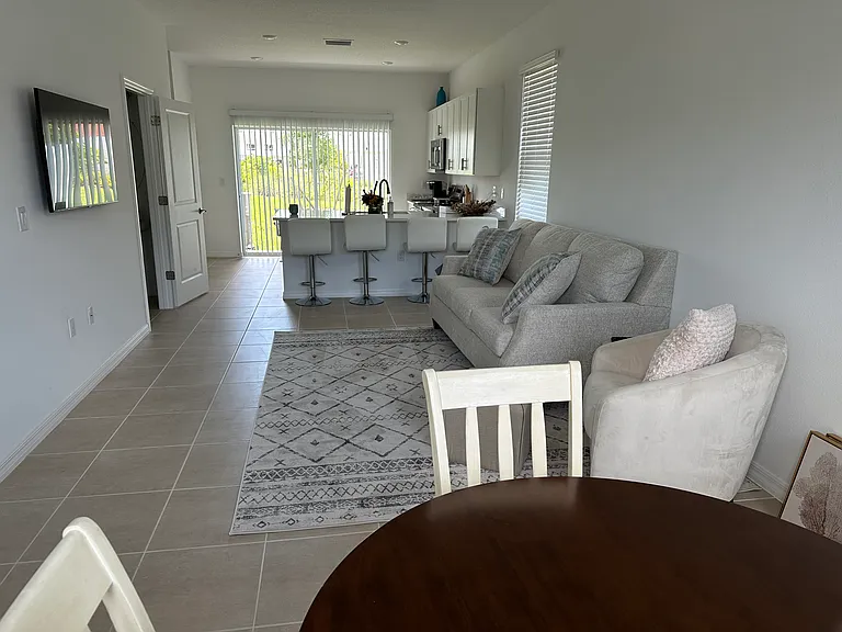 kitchen table seats 4 as well as breakfast bar