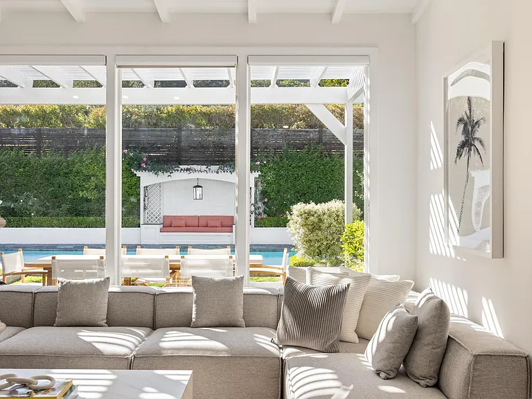 Bask in the natural light and comfort of the stylish living room ambiance.