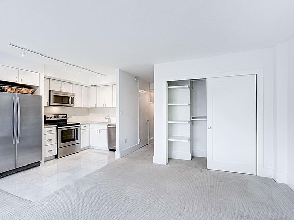 Stainless Steel Appliances ; Marble Countertops
