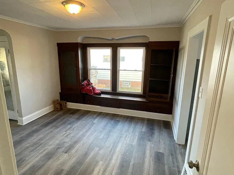 Dining room with original charm provided by the built in custom cabinetry