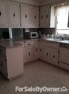 Custom Kitchen Cabinets
						:
						Custom made kitchen cabinets plus built in dishwasher