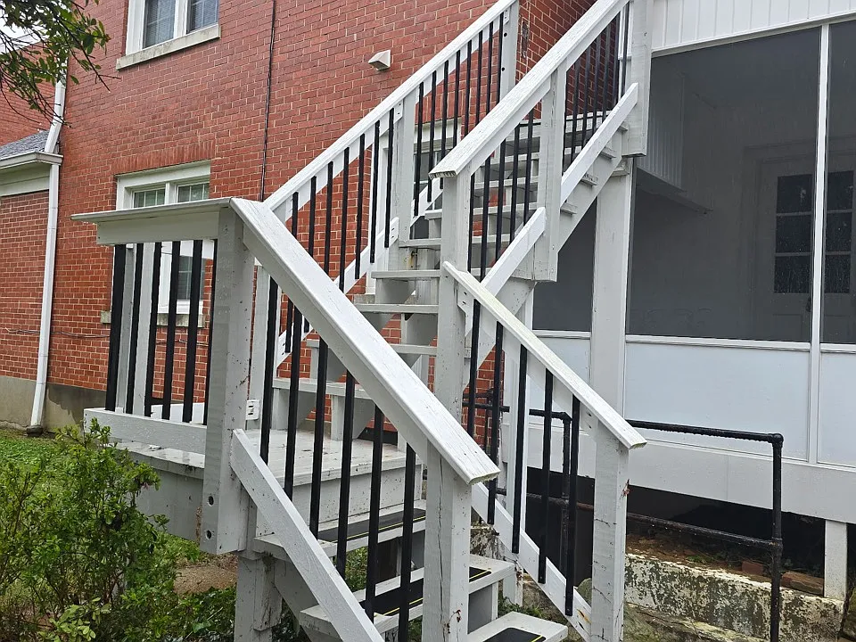 Back steps to enter screened in porch and apartment 2 back door