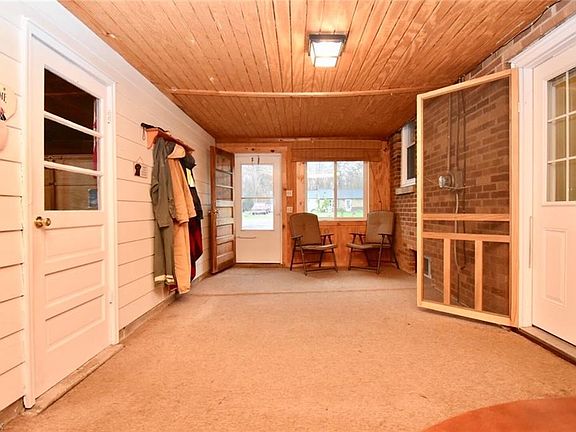 The enclosed breezeway is attached to the 2 car garage.
