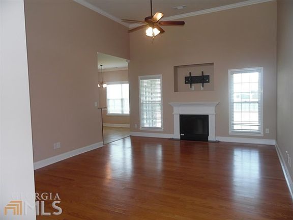 Large living room with an electric fire place