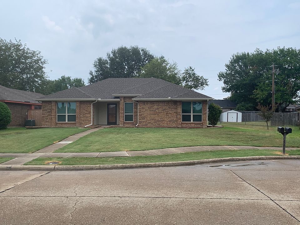 Curbside view of House