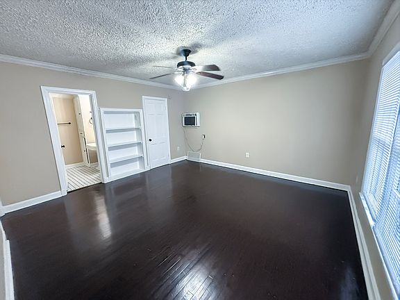 Picture it: your very own secluded sanctuary in the heart of Midtown. This is a huge bedroom for a guesthouse!
