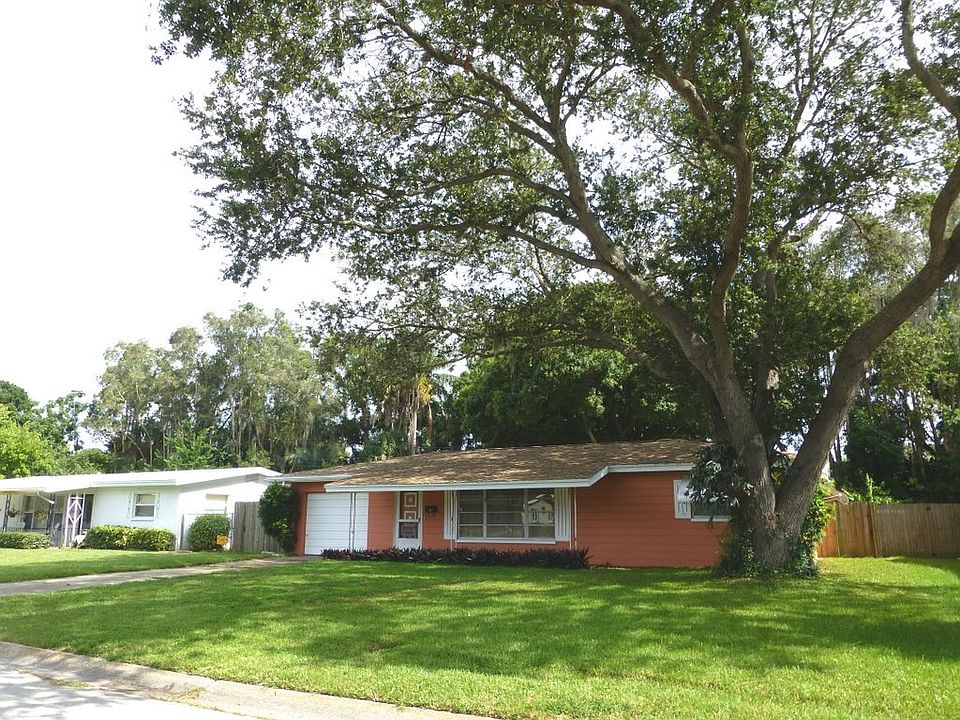 Masonry home on tree shaded lot