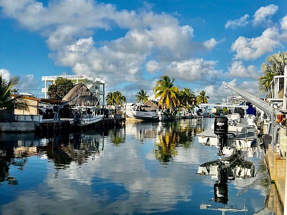 deep wide canal with bay access and easy ocean access