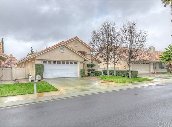 Home is located on street of homes of  manicured lawns