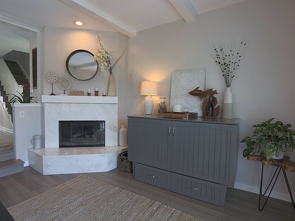 Family room with Murphy bed and gas fireplace