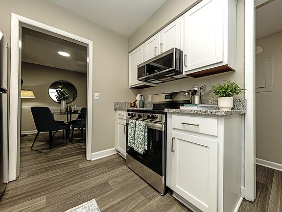 Kitchen with granite countertops and stainless steel appliances