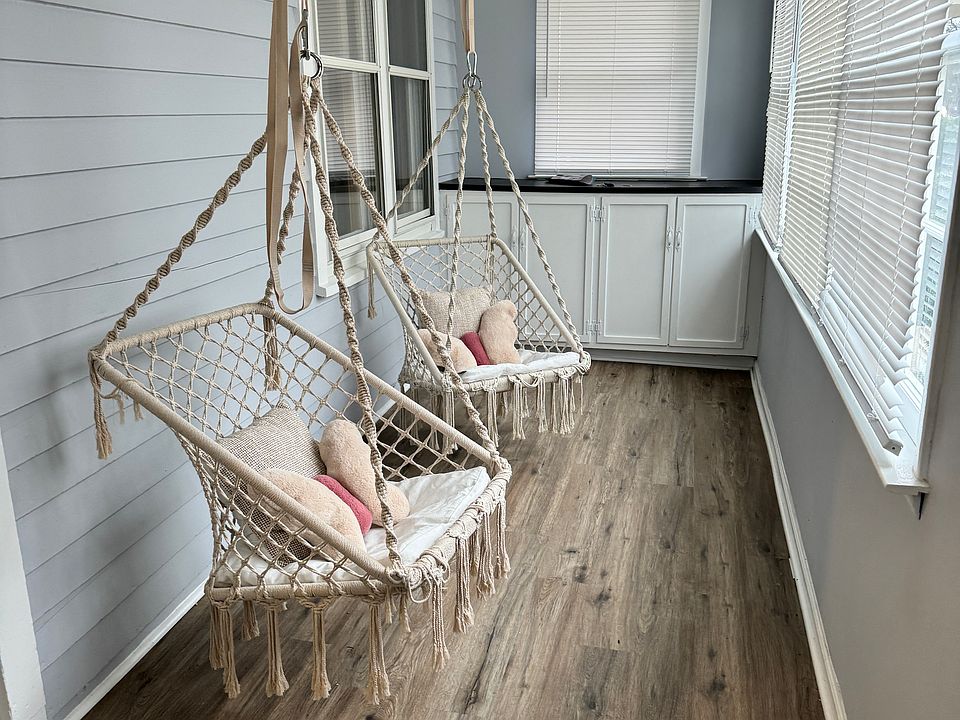 3-season sunporch with additional storage, hanging chairs (if desired), and vinyl plank floors