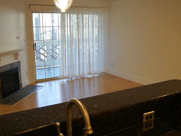 Open living dining and kitchen looks onto it.===nice screened porch 8' off ground.