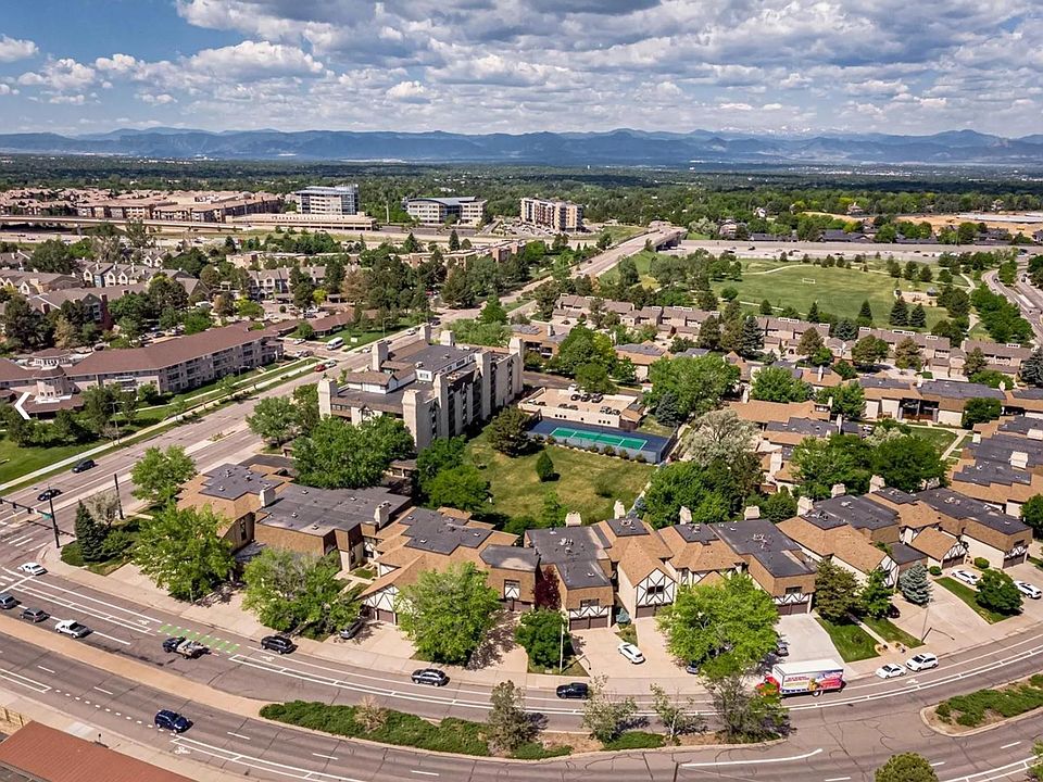 Eastmoor Condominium Complex. tennis courts, pool, clubhouse, and surrounding parking.