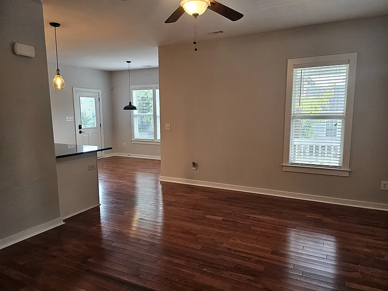 View from side hallway into living room